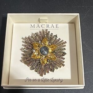 Macrae gold flower brooches